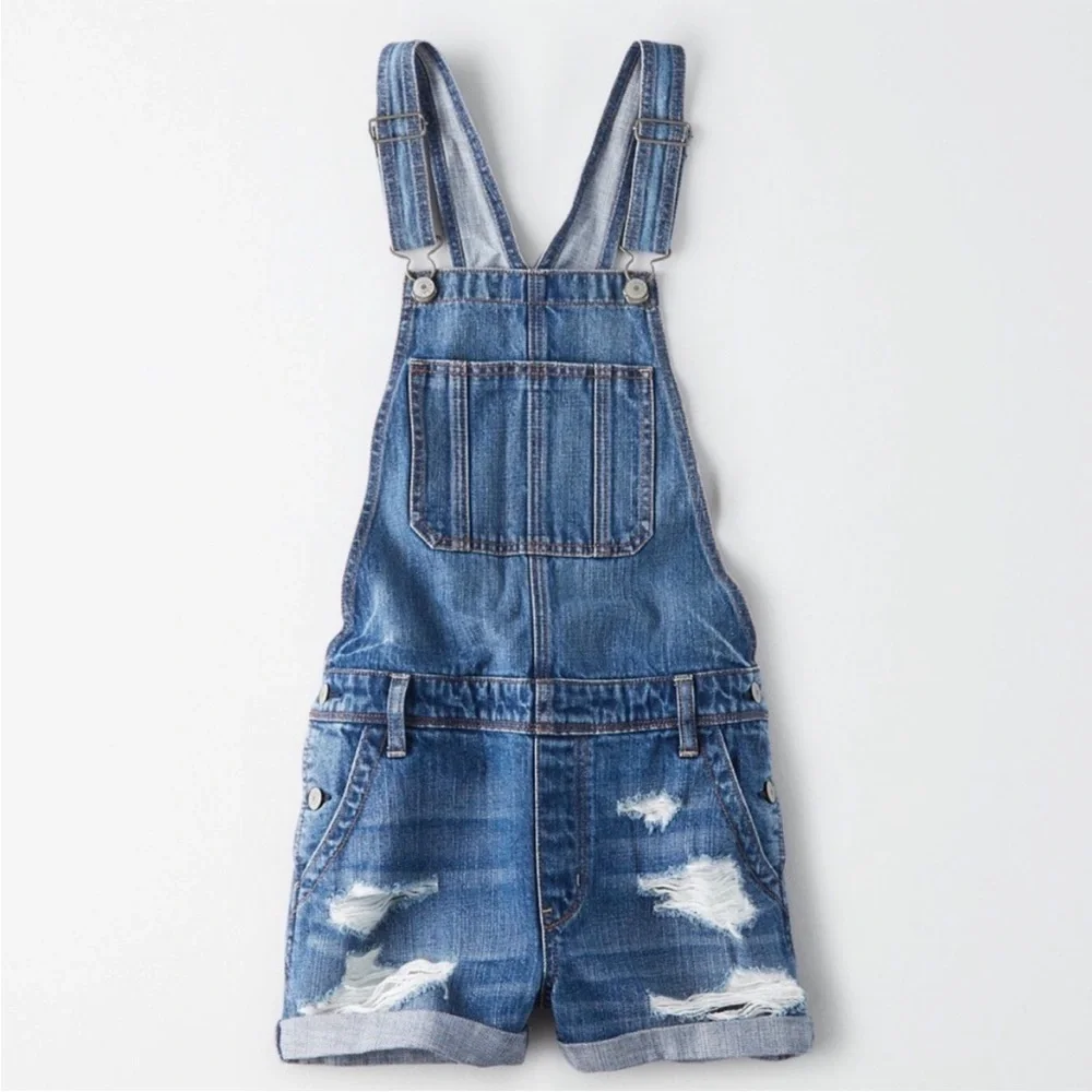 American Eagle Distressed Tomgirl Shortall Denim
Overalls in Medium Wash, Small - Picture 2 of 6